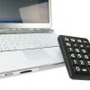 PC-nummertastatur for svaksynte sort bakgrunn med hvite symboler